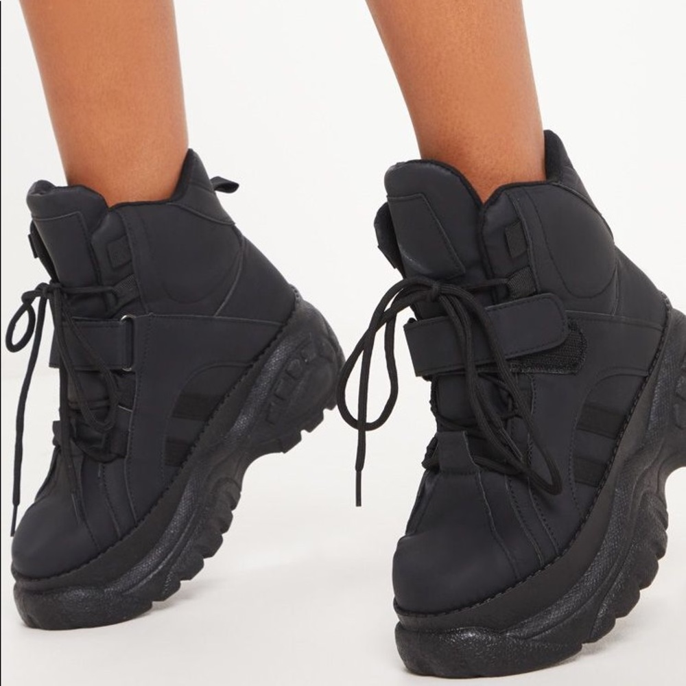 Black platform high top sneaker
